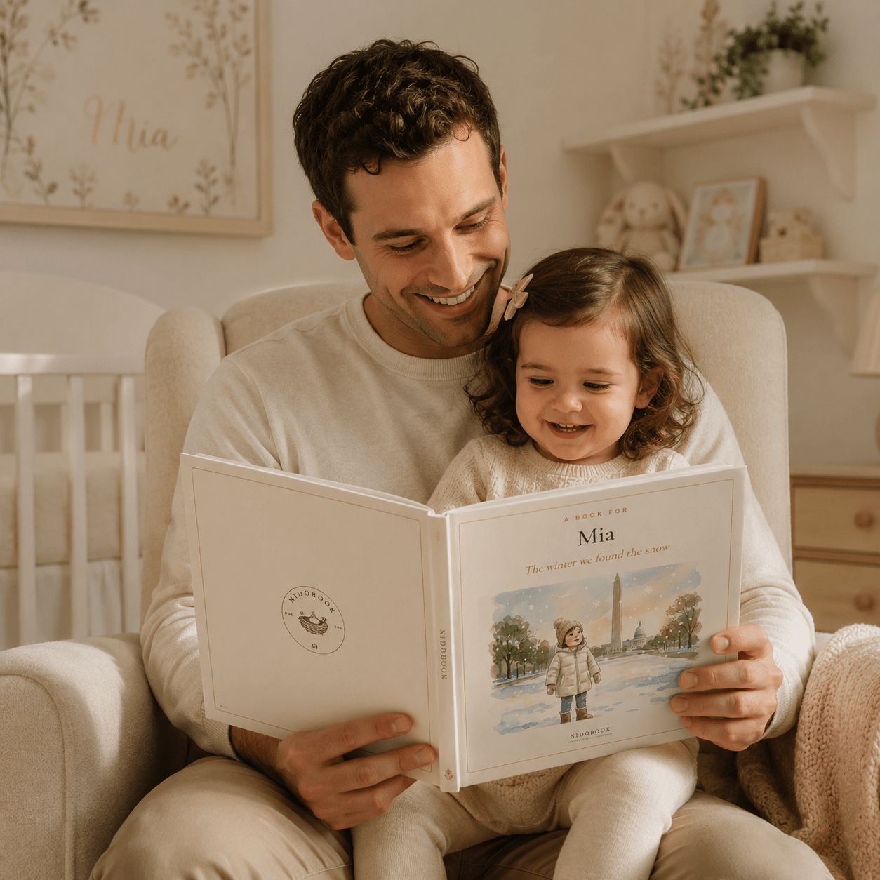 A father and young daughter smiling while reading a square Mia Nidobook together